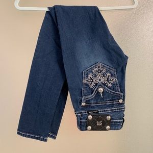 Medium wash Miss Me skinny jeans